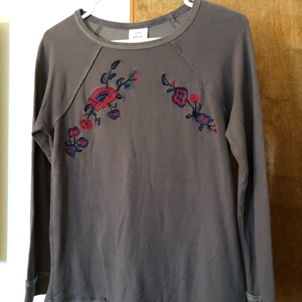Olive green embroidered top.